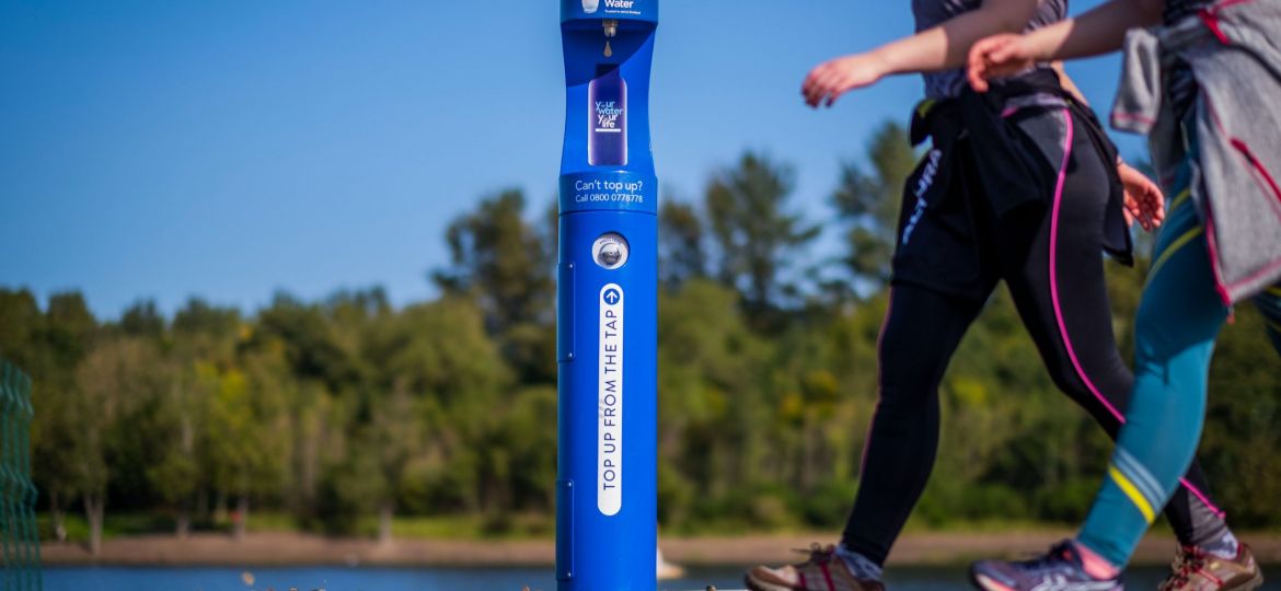 scottish water top up tap 2 people walking
