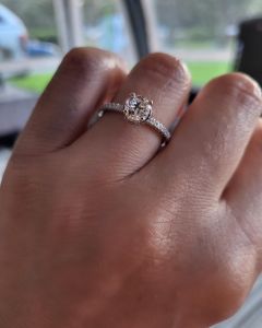 Hand showing engagement ring